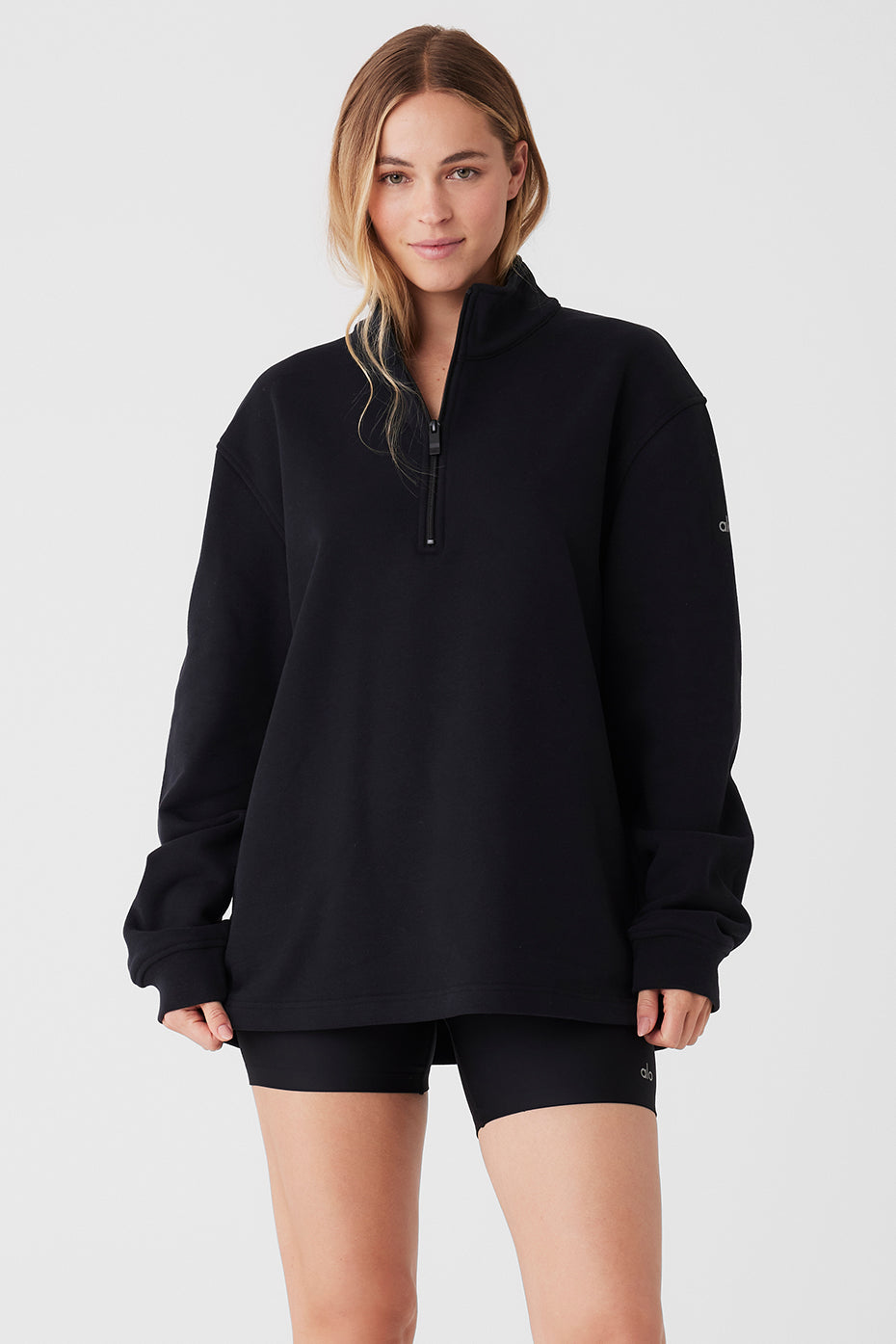 Men's quarter zip pullover in black, perfect for outdoor workouts.