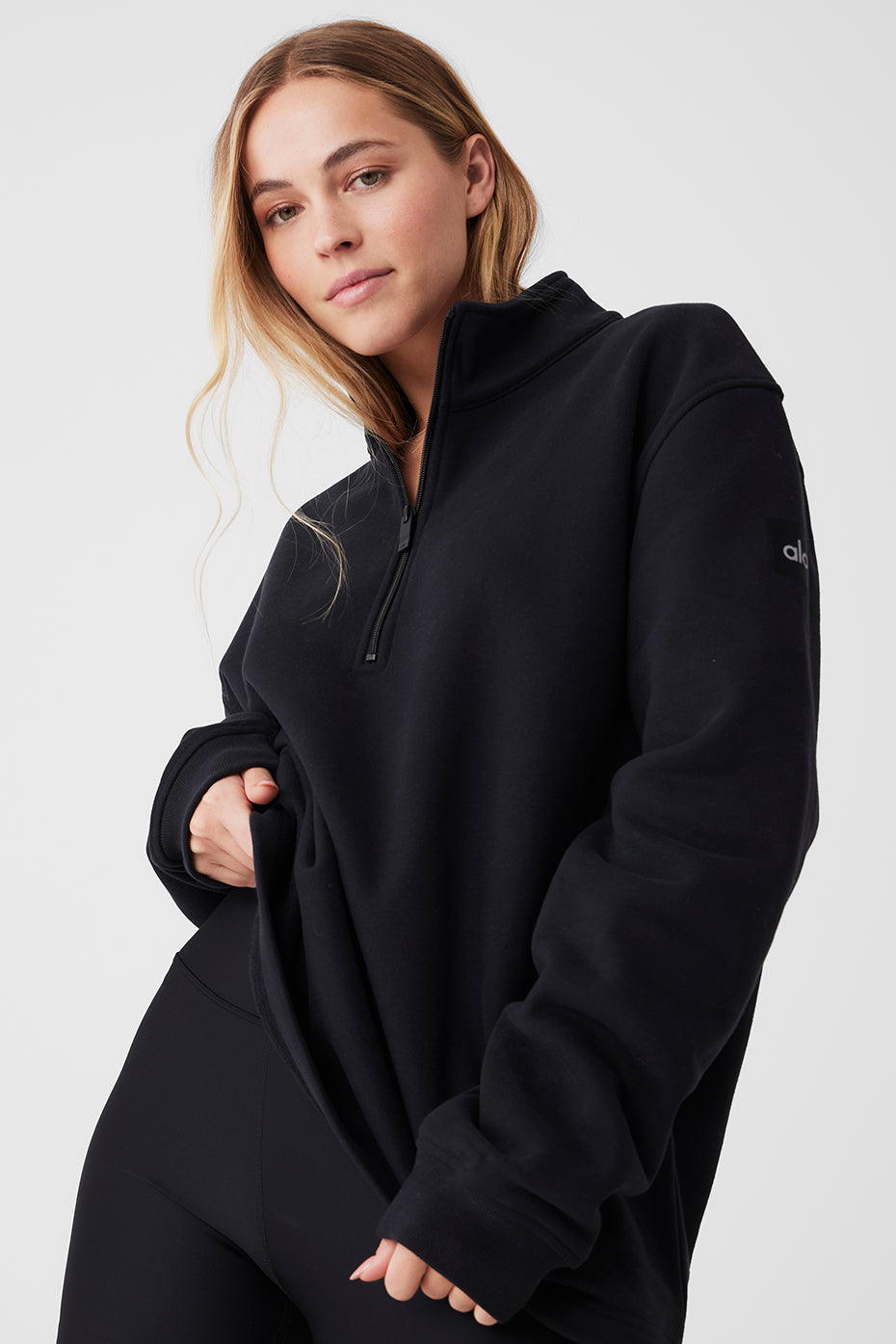 Mens quarter zip pullover in black, perfect for outdoor workouts.