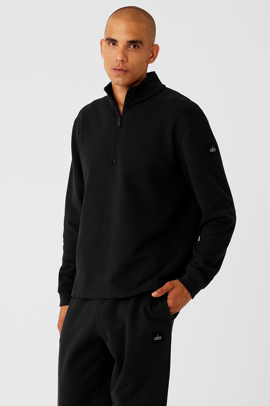 Back view of the quarter zip pullover sweatshirt, highlighting its sleek style.