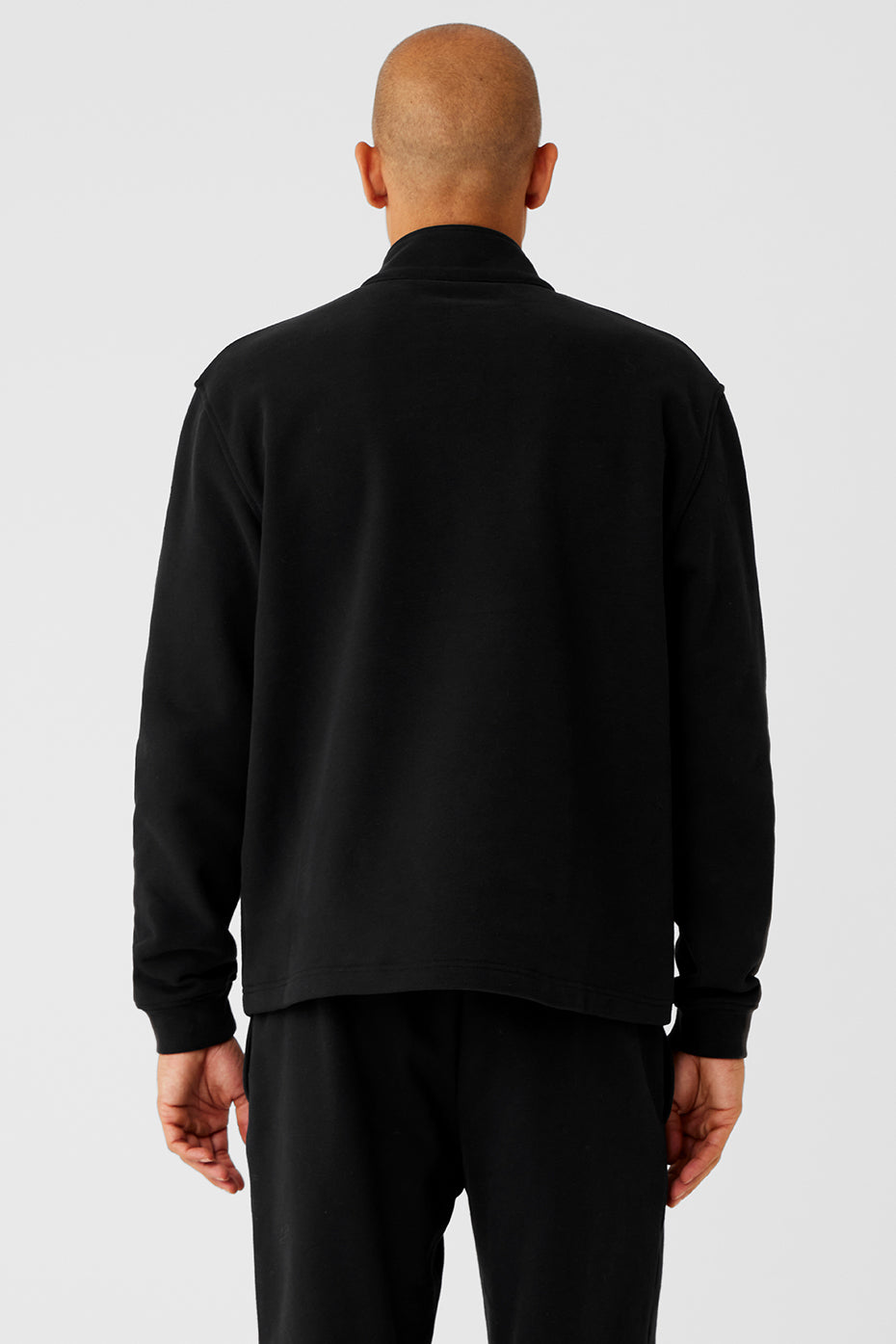 Side angle of the heavyweight hoodie, showcasing the quarter zip design.