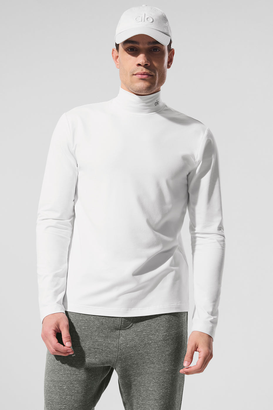 White mock neck t shirt with reflective logo suitable for athletic wear