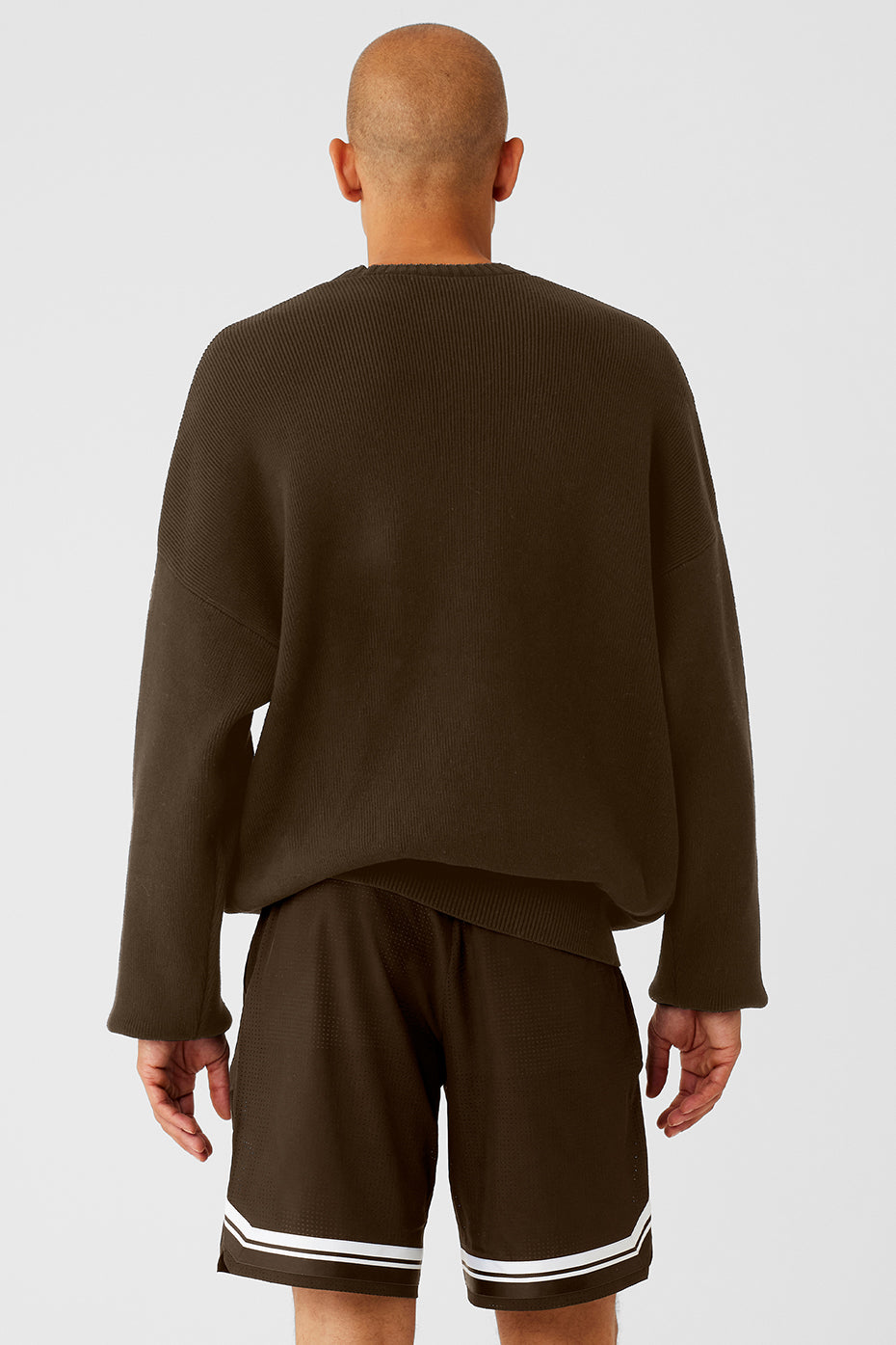Close-up of ribbed cuffs and hem on a heavyweight knit sweater