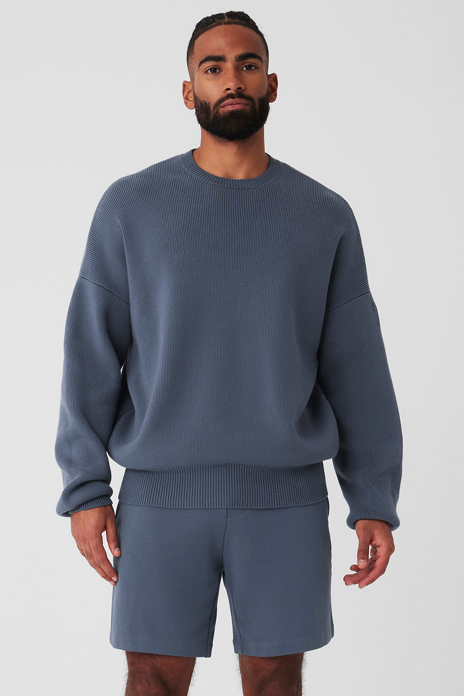 Front view of the oversized crew neck sweater in bluestone.