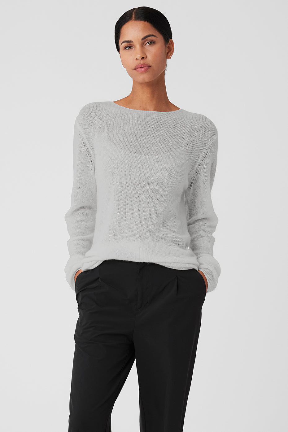 Dove grey cashmere long sleeve sweater styled with a jacket.