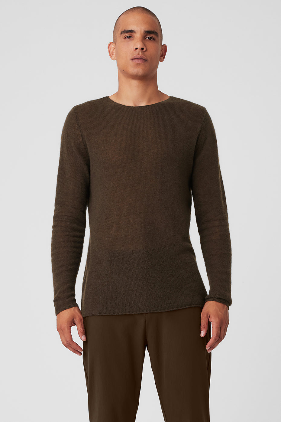 Close-up of the espresso cashmere long sleeve sweater showcasing its soft texture.