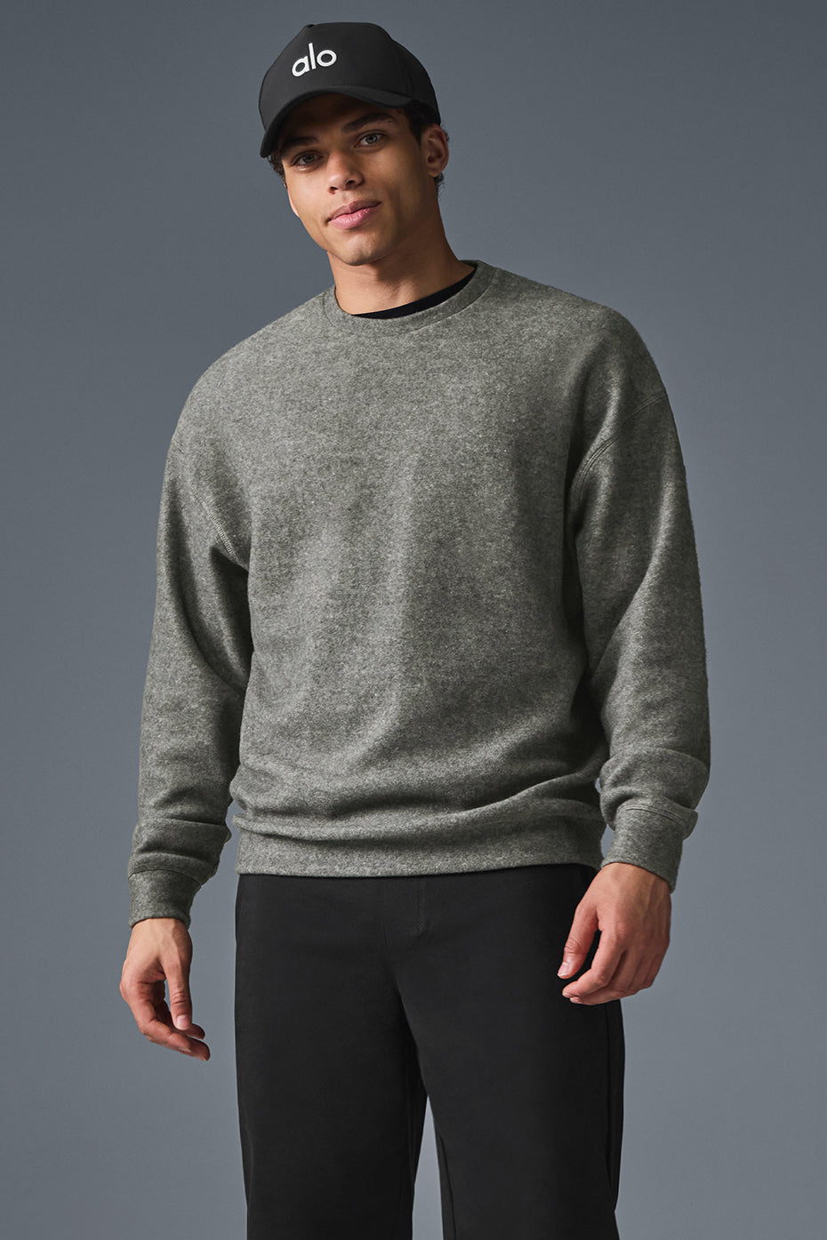 Close-up of the ultra-soft grey tri-blend fabric on the crew neck sweatshirt.