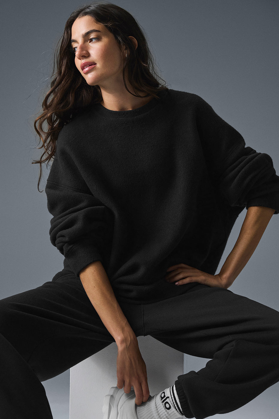 Front view of Triumph Restore oversized crew neck sweatshirt in black.
