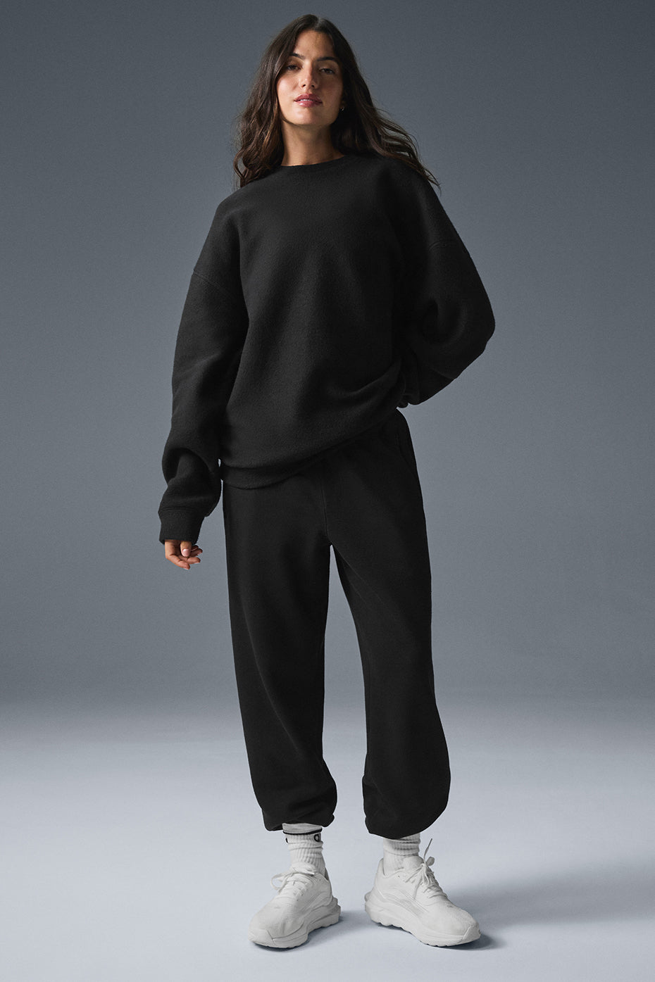 Front view of Triumph Restore oversized crew neck sweatshirt in black.