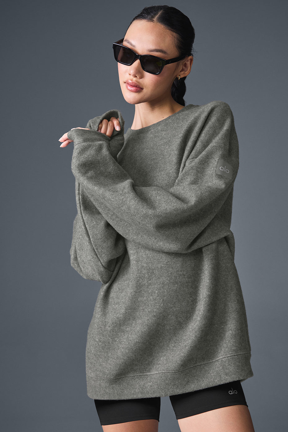 Close-up of grey triblend fabric texture on oversized sweatshirt