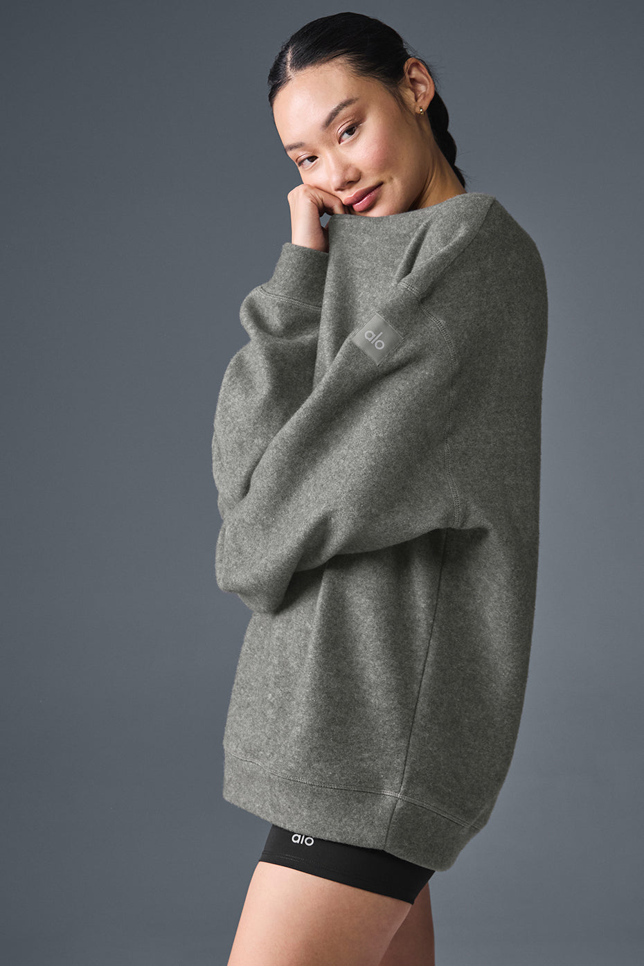 Back view showing relaxed fit of womens crew neck sweatshirt