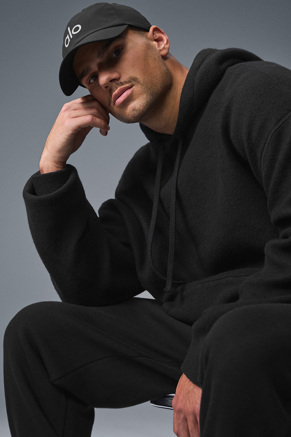 Front and back view of womens oversized hoodie draped on hanger
