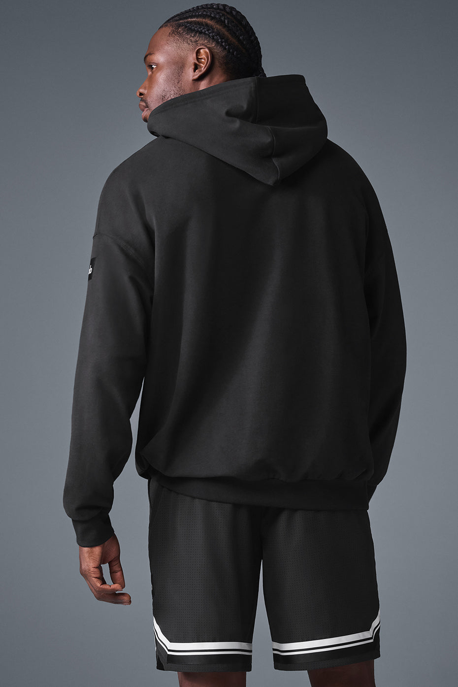 Side view of the parke comfort hoodie, highlighting the dropped shoulders and kangaroo pocket.