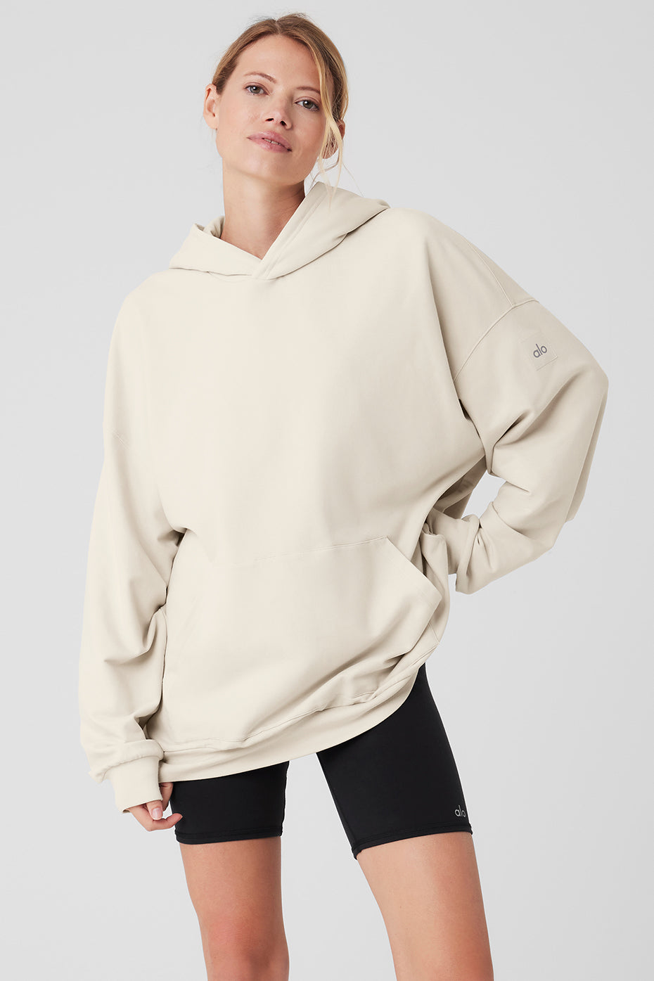 Front view of the Essential Comfort Hoodie in Bone, showcasing its stylish design.