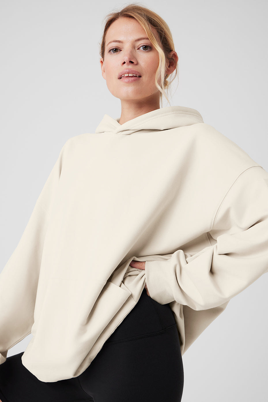 Front view of the Essential Comfort Hoodie in Bone, showcasing its stylish design.