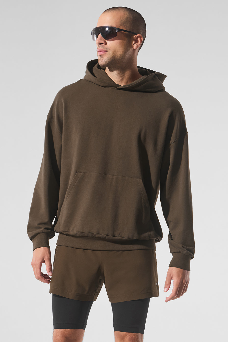 Front view of the Double Take Hoodie in espresso, highlighting its relaxed fit and kangaroo pocket