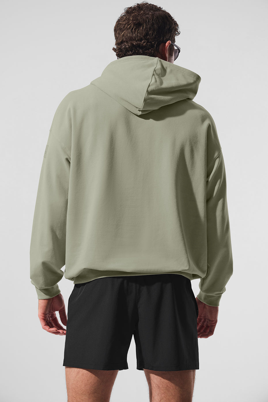 Model wearing the Double Take Hoodie paired with jeans for casual outings