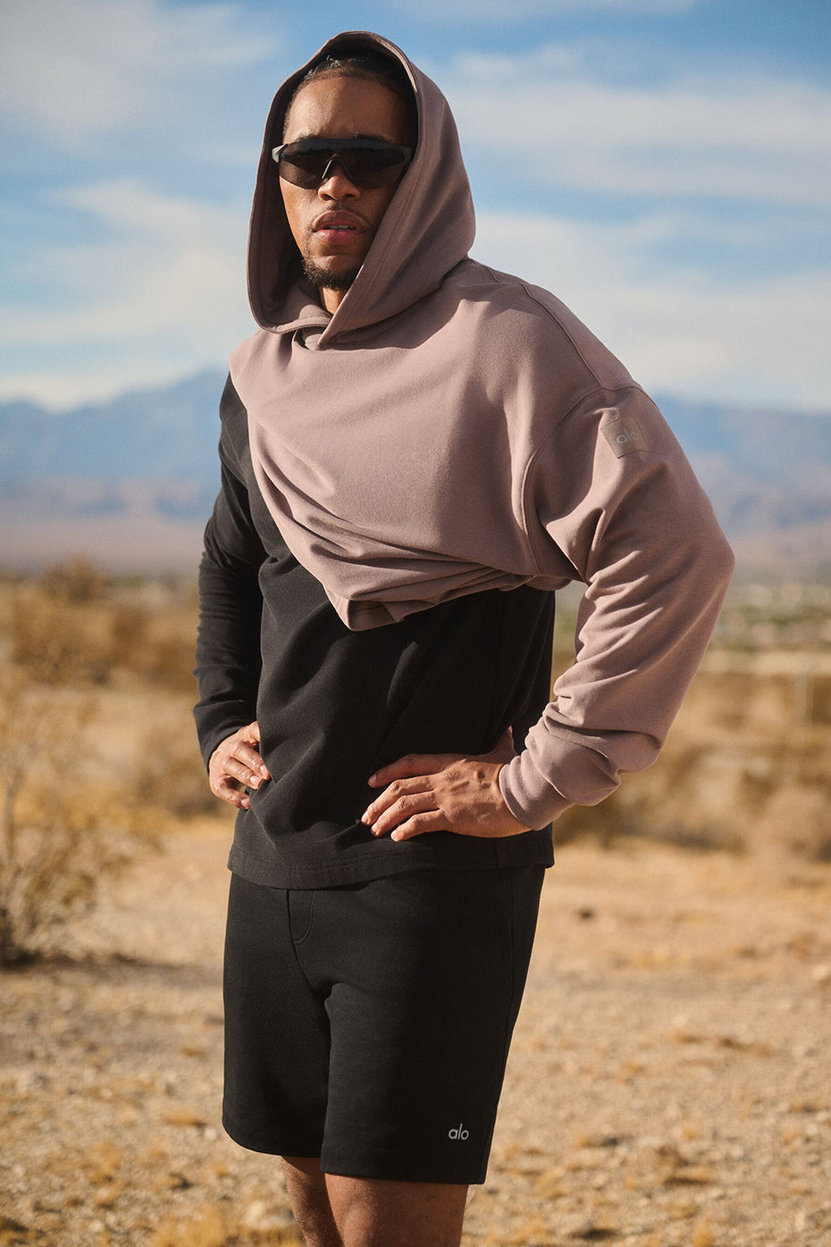 Close-up of the banded cuffs and kangaroo pocket on the hoodie