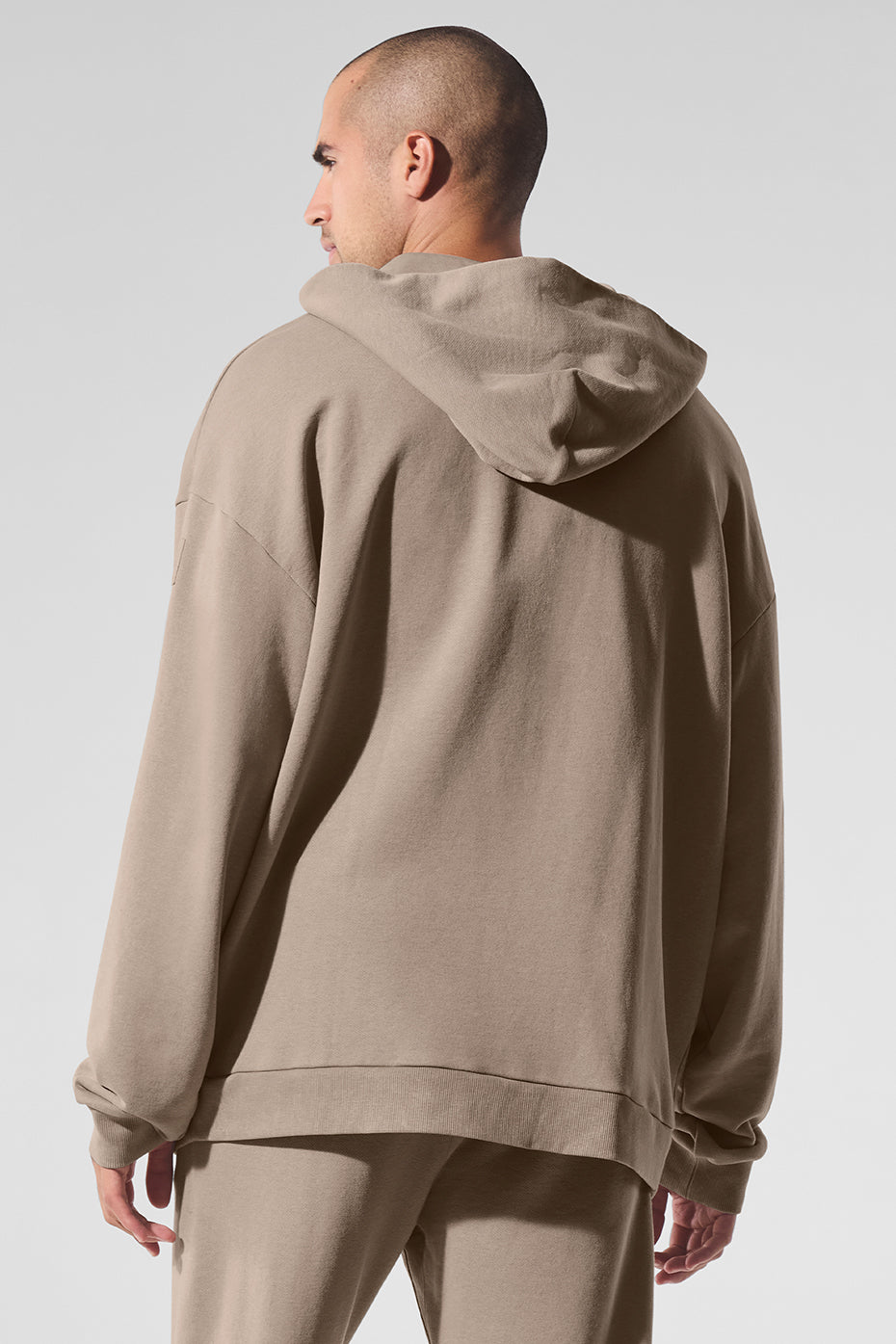 Detail shot of faded vintage fabric on oversized zip up hoodie