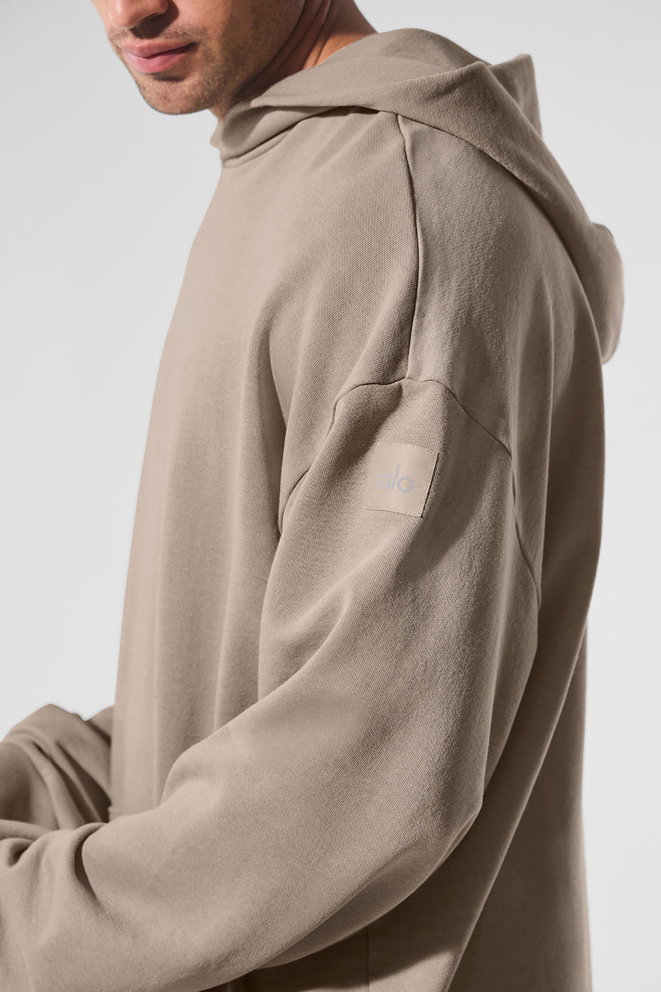 Model wearing relaxed fit vintage hoodie for casual outdoor wear