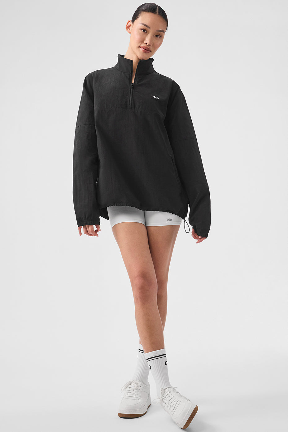 Front view of the retro lightweight quarter zip pullover in black.