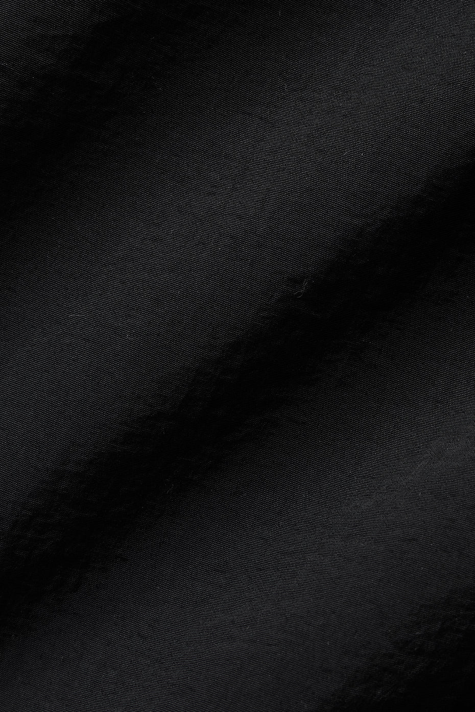 Side view showcasing the relaxed fit and zippered pockets of the pullover.