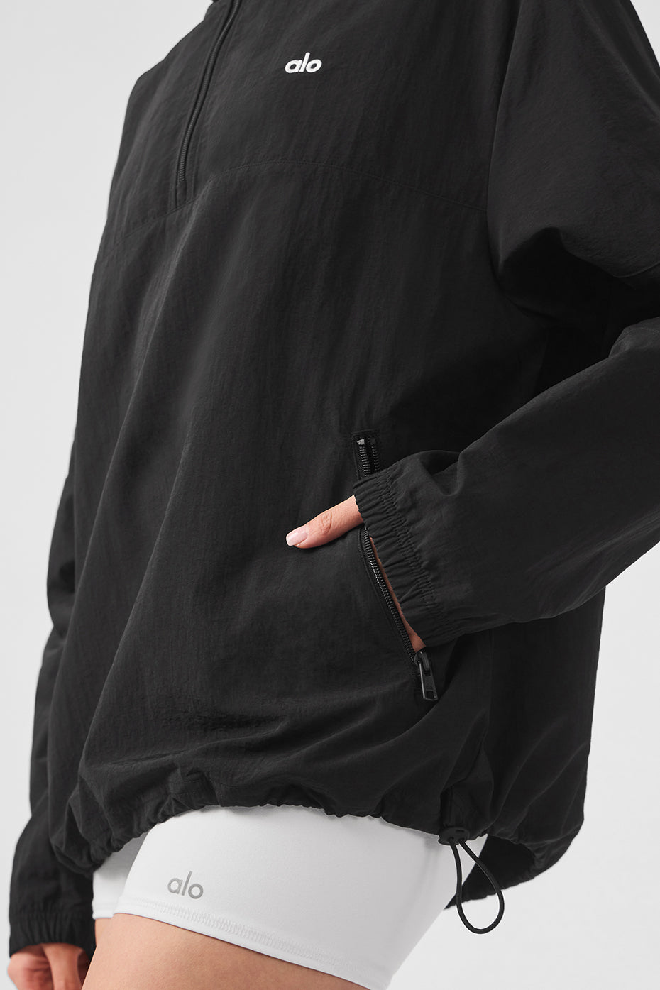 Model wearing the quarter zip pullover sweater with matching pants.