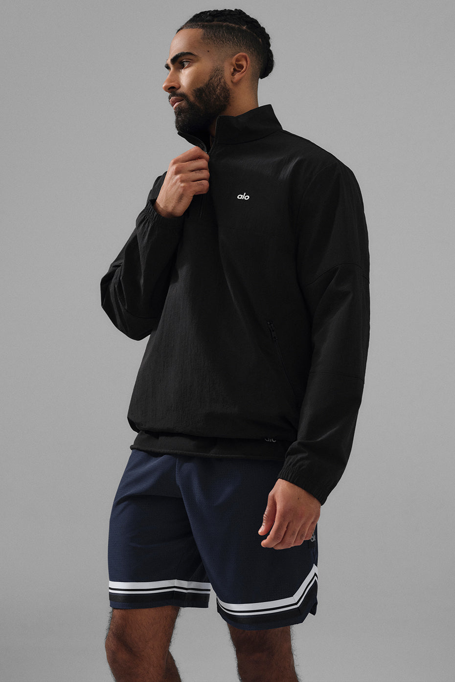 Front view of mens lightweight pullover showcasing zippered pockets and adjustable hem