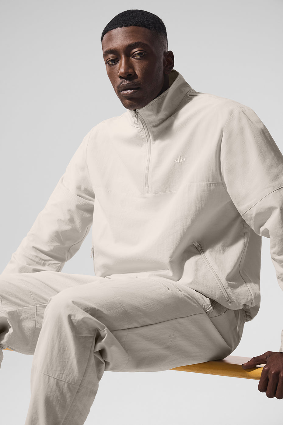 Side angle of lightweight jacket worn outdoors, perfect for cool morning runs