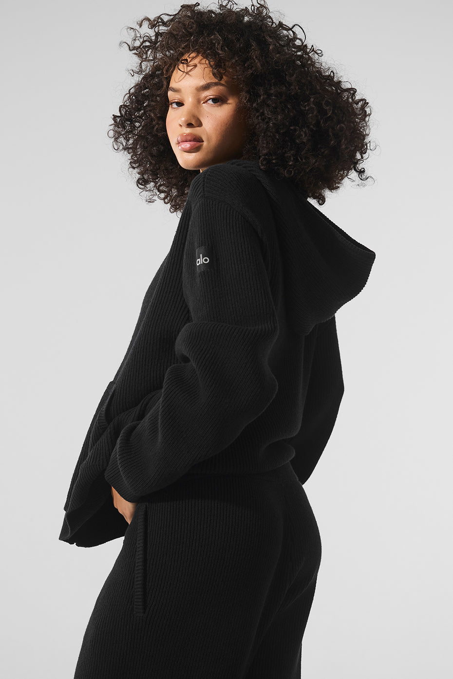 Back view of the mens full zip sweater, demonstrating its stylish silhouette.