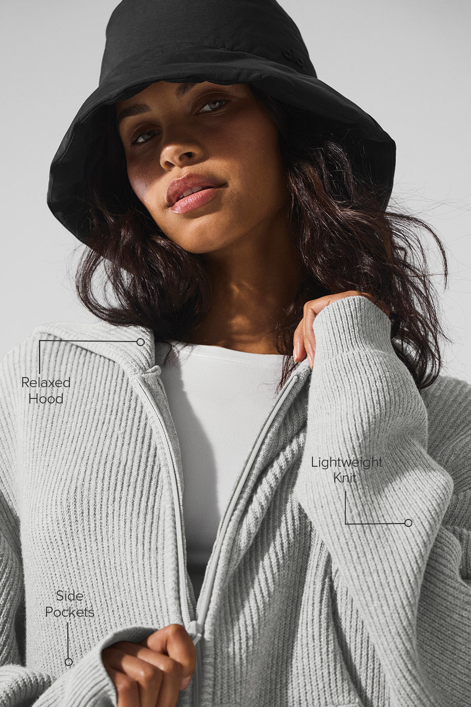 Casual outfit featuring the grey full zip sweater with dark jeans