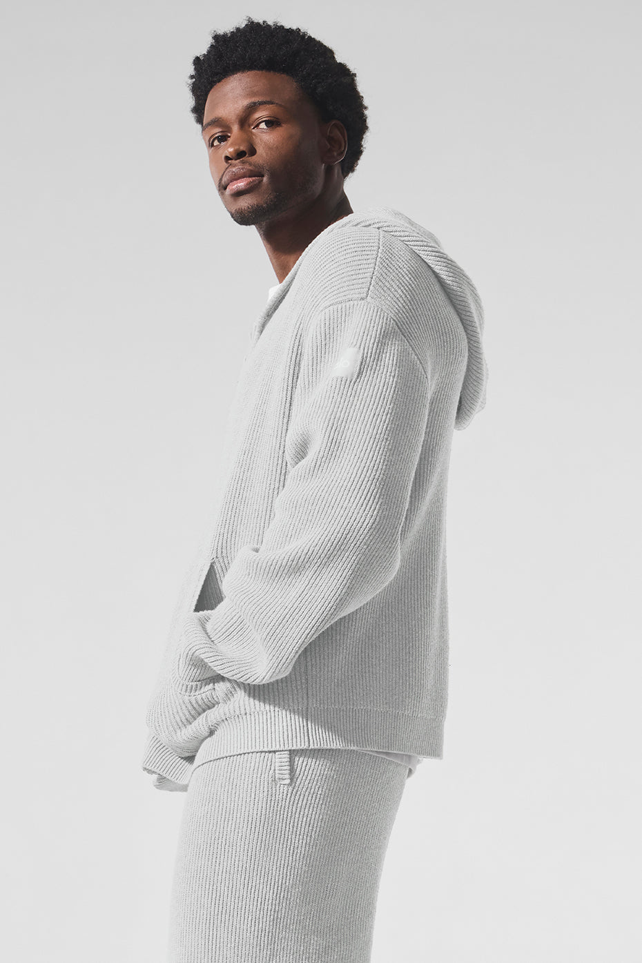 Front view of the oversized rib knit full zip sweater in athletic heather grey.