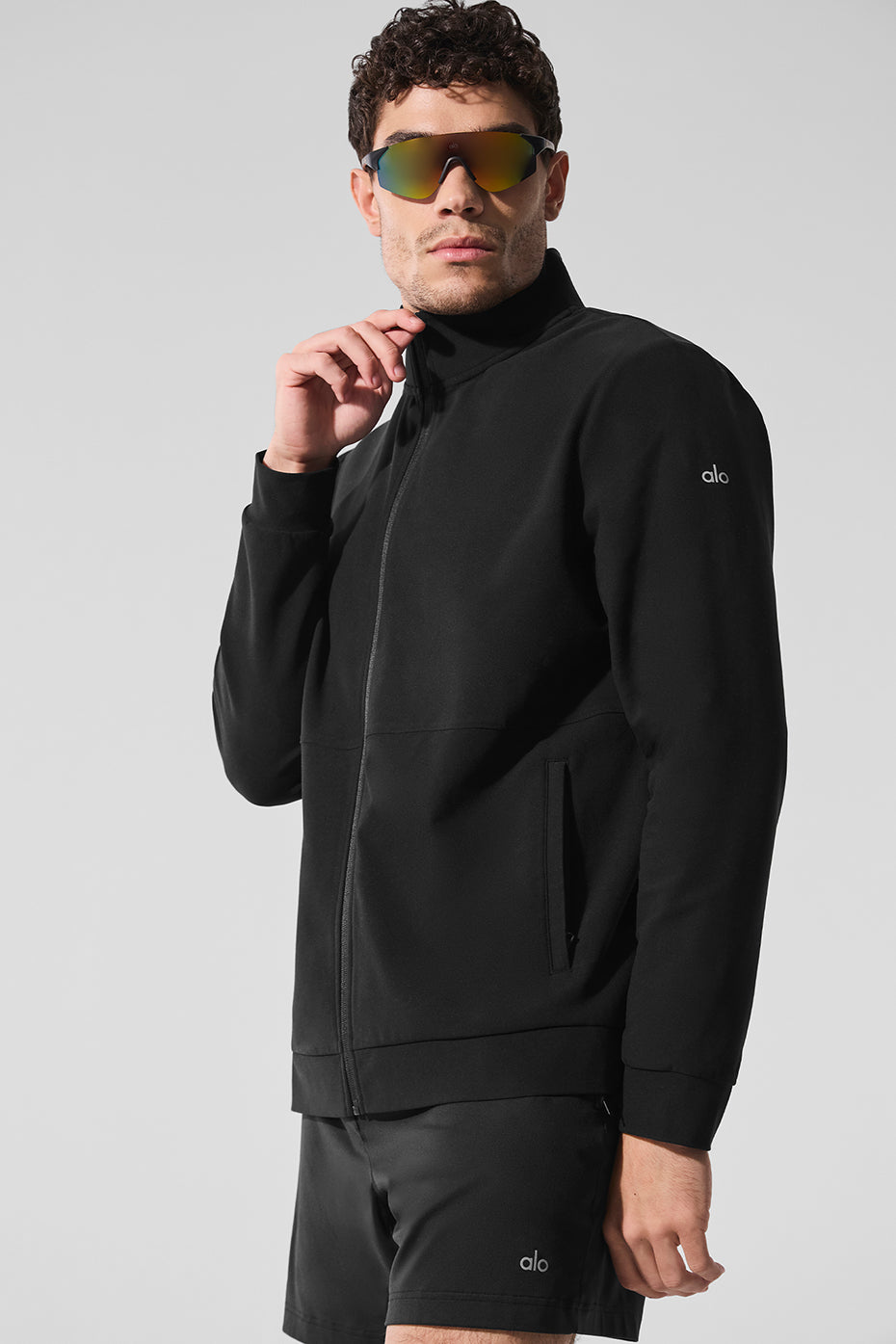 Front view of Conquer Max performance zip top in black.