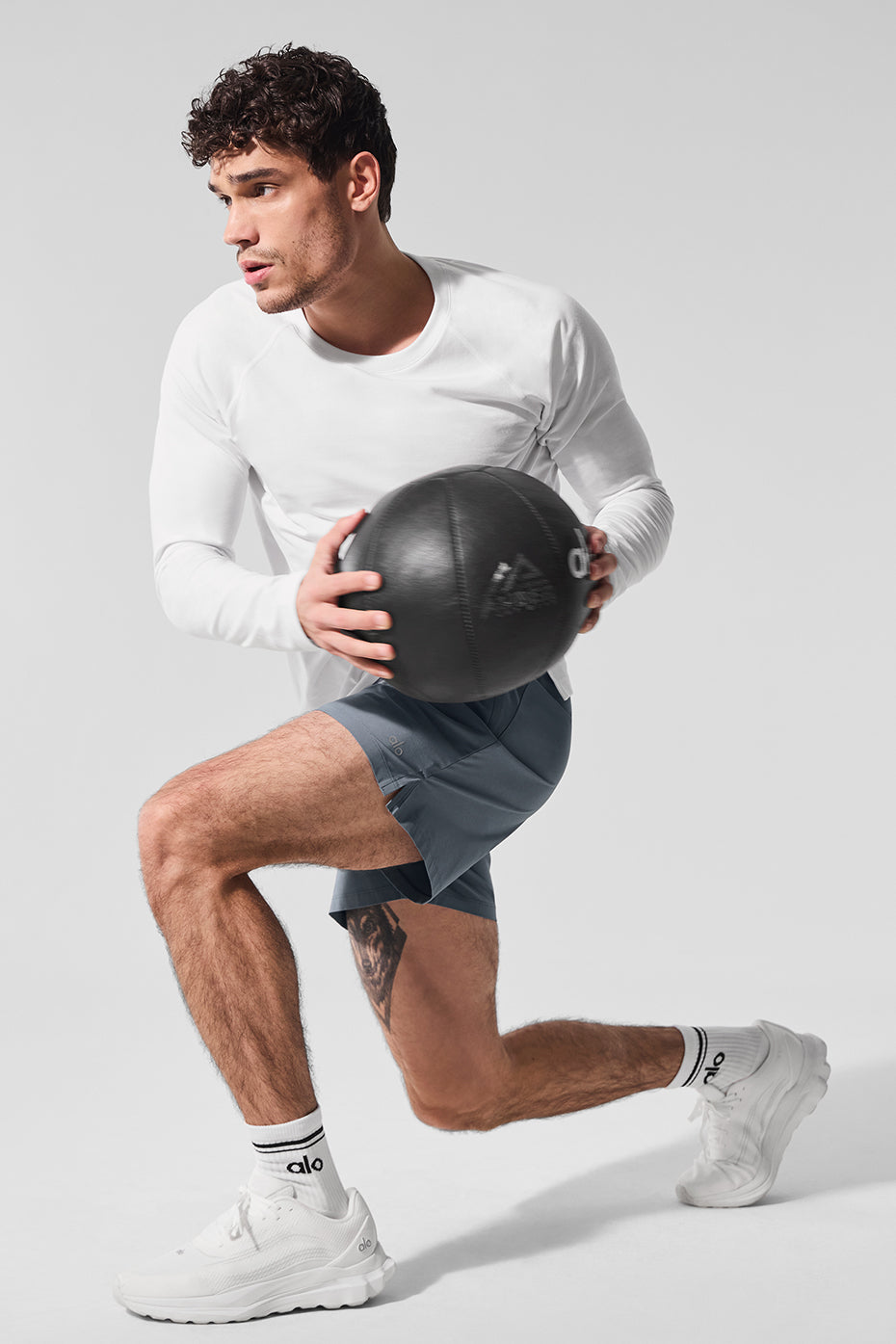Model wearing the performance wear long sleeve shirt during workout