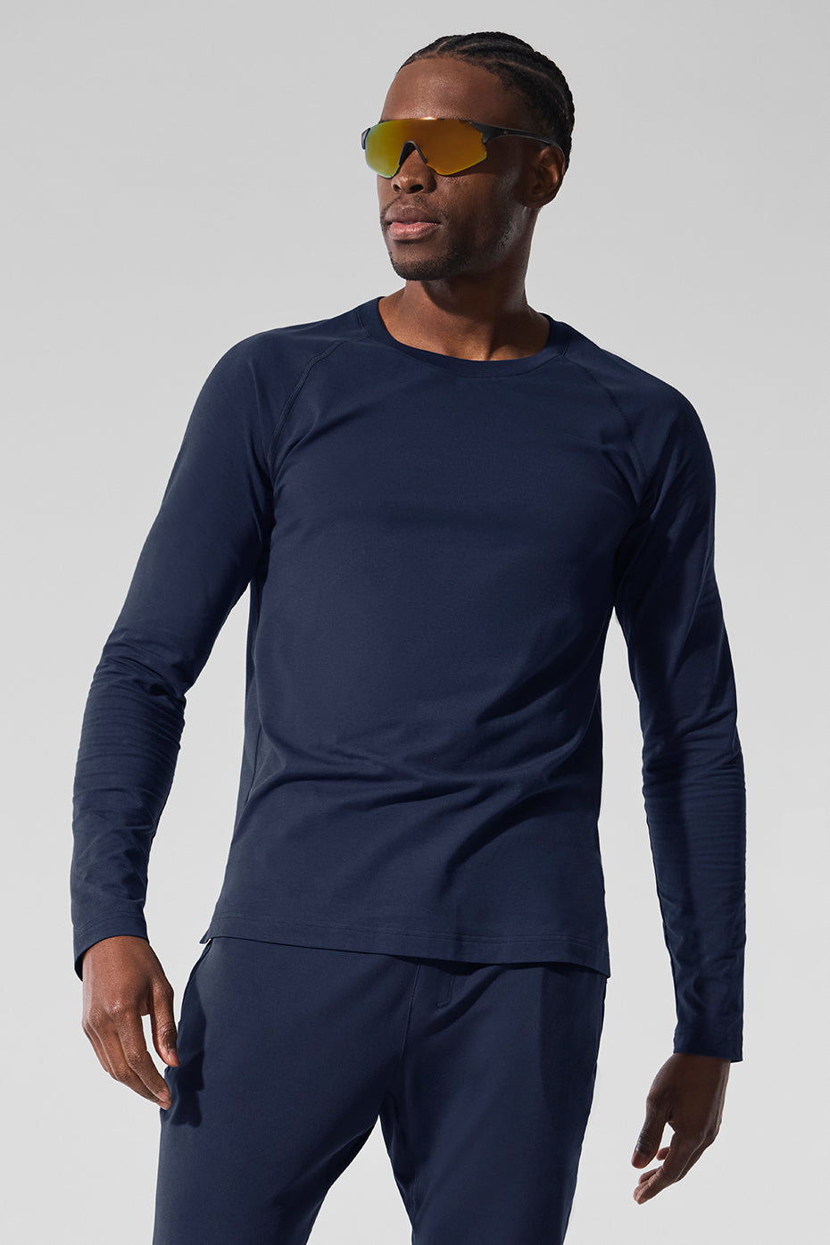 Front view of ALO Vapor Long Sleeve Shirt in Navy, ideal for fitness activities.
