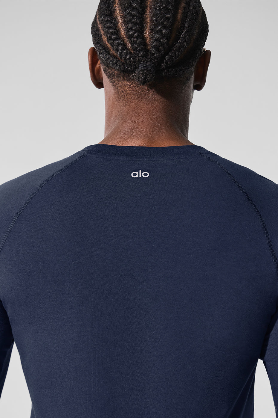 Front view of ALO Vapor Long Sleeve Shirt in Navy, ideal for fitness activities.