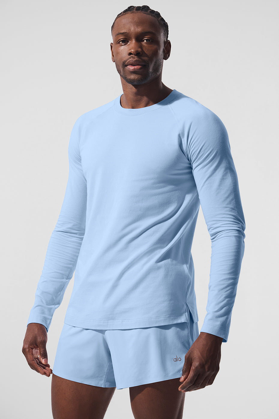 Wundermost crewneck long sleeve t-shirt in Seashell Blue, worn during a run