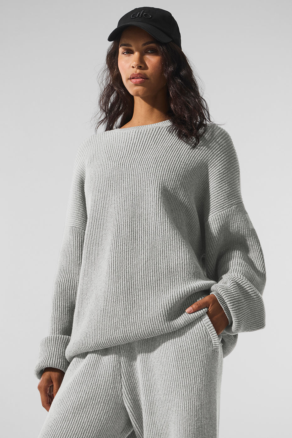 Front view of the heather grey rib knit crew neck sweater, showcasing its classic design.