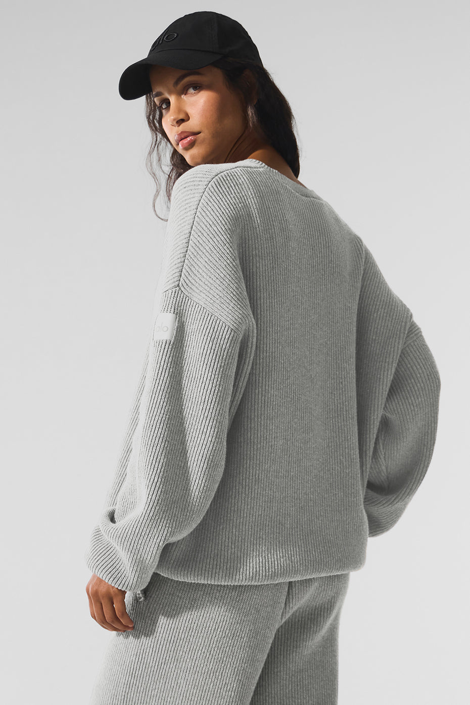 Front view of the heather grey rib knit crew neck sweater, showcasing its classic design.