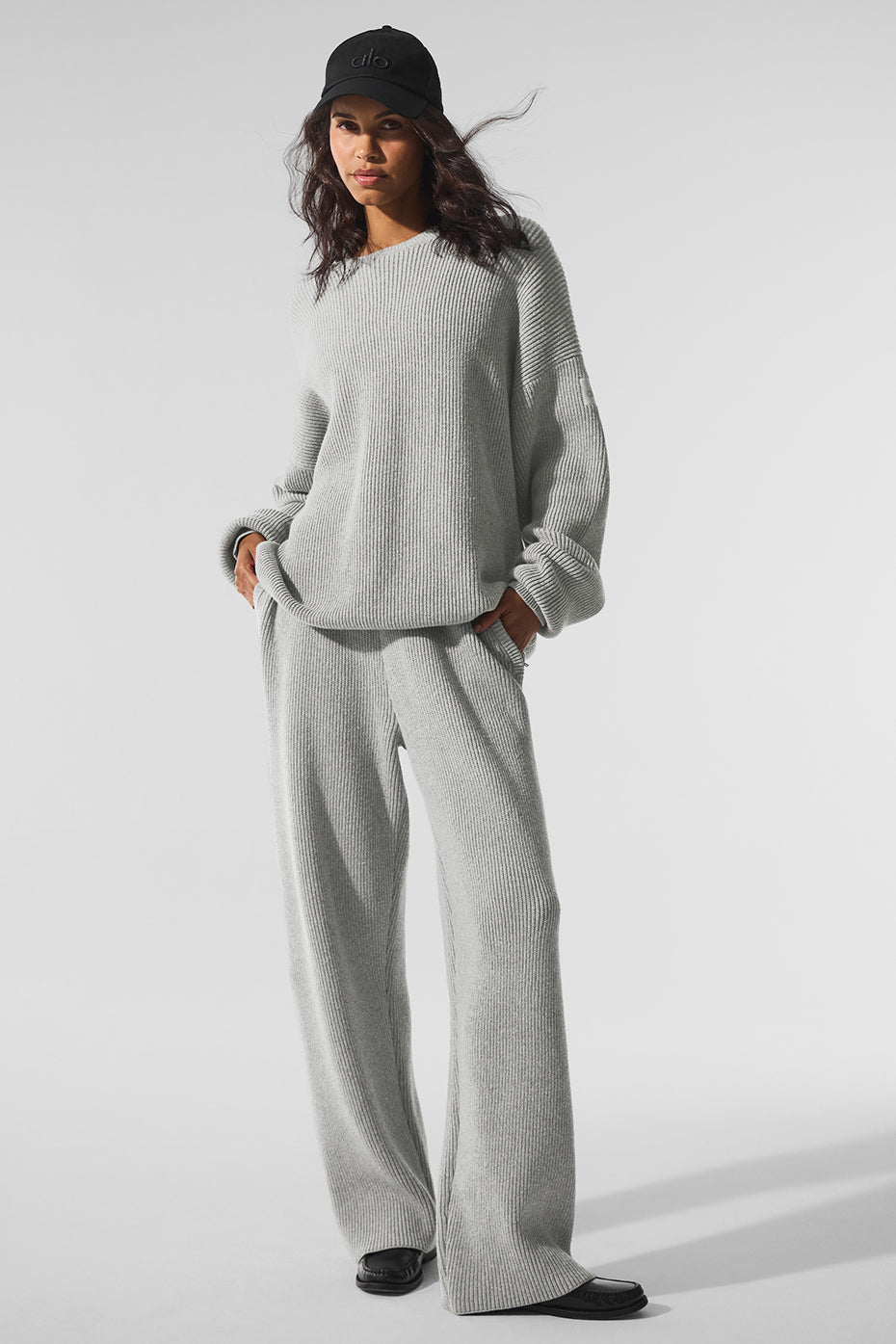 Close-up of the rib knit texture on the womens crew neck sweater in heather grey.