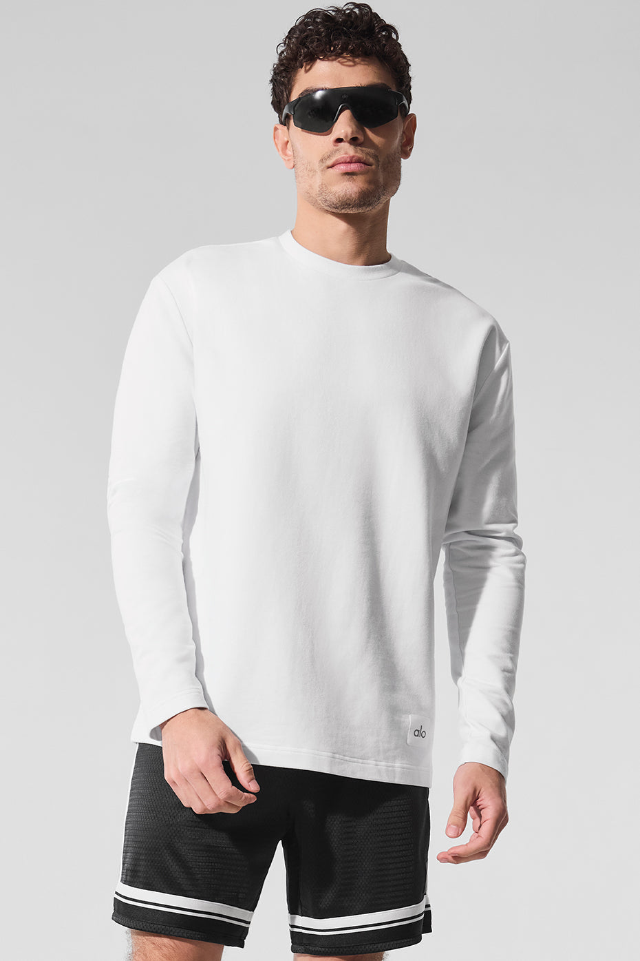 Front view of the Essential Long Sleeve Crew Top in white, ideal for casual wear.