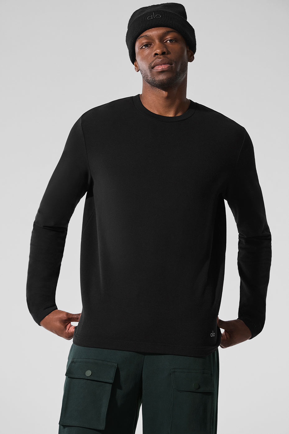 Front view of the black crew neck long sleeve shirt, ideal for everyday wear.