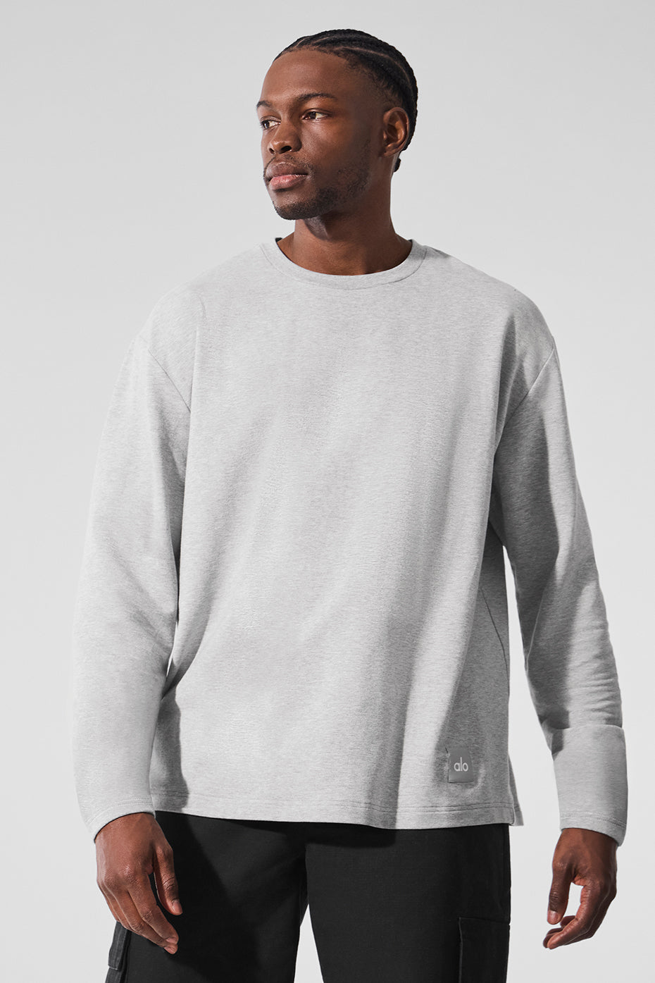 Front view of Essential Athletic Long Sleeve Crew in Heather Grey