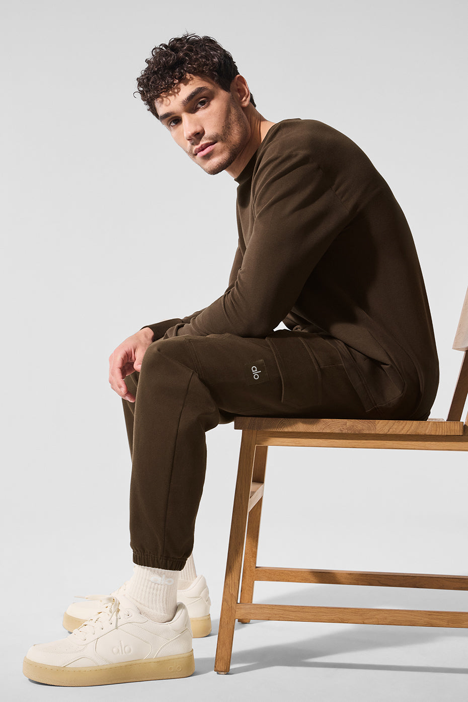 Close-up of the espresso long sleeve crew top, highlighting the fabric texture.