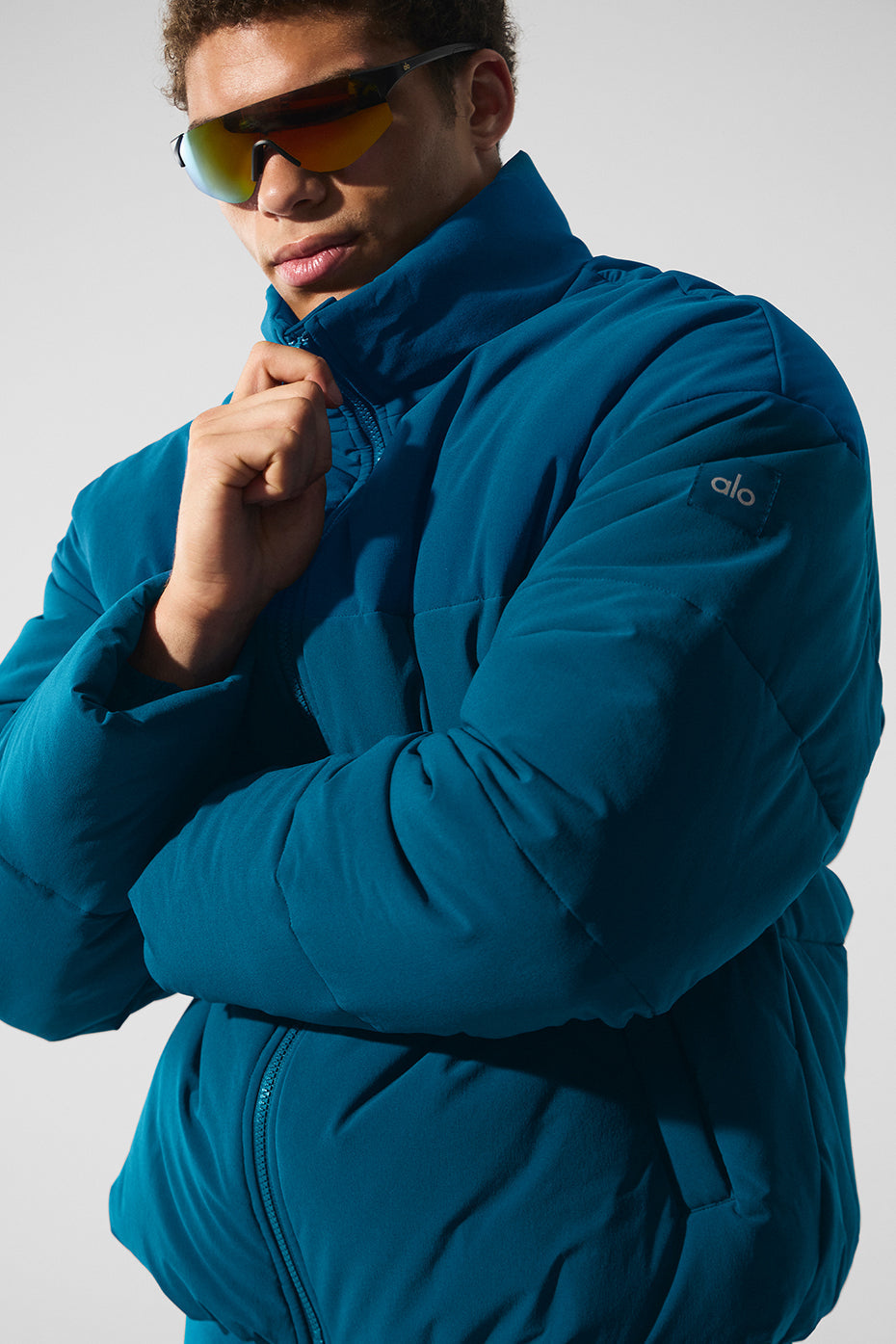 Model wearing the lightweight puffer jacket layered over a hoodie, suitable for city commutes