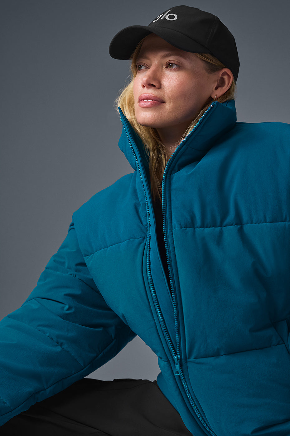 Mens puffer jacket with standup collar and Eclipse Blue color, styled for city winter wear
