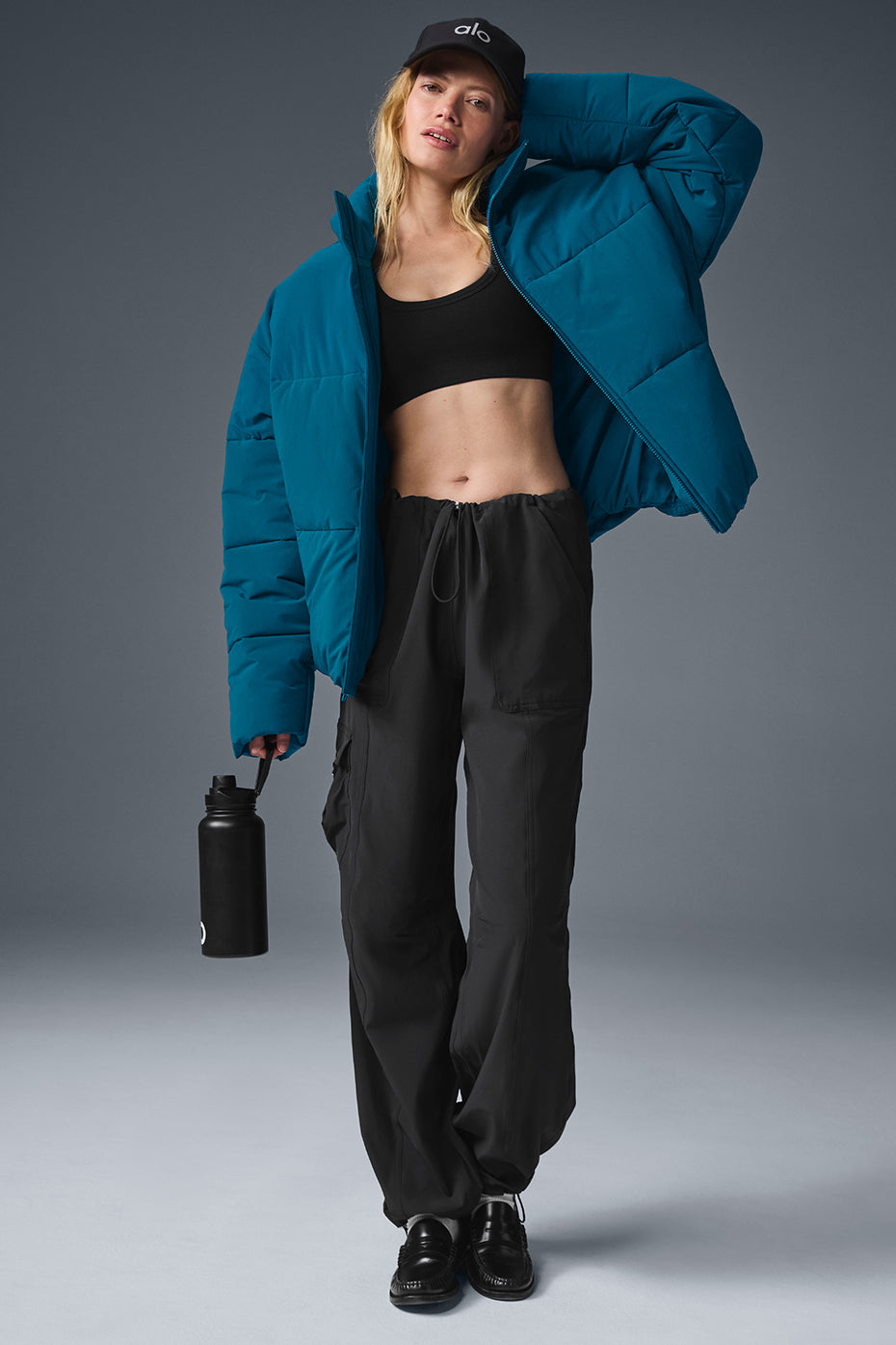 Side view of the lightweight urban puffer jacket with plush filling and stylish design