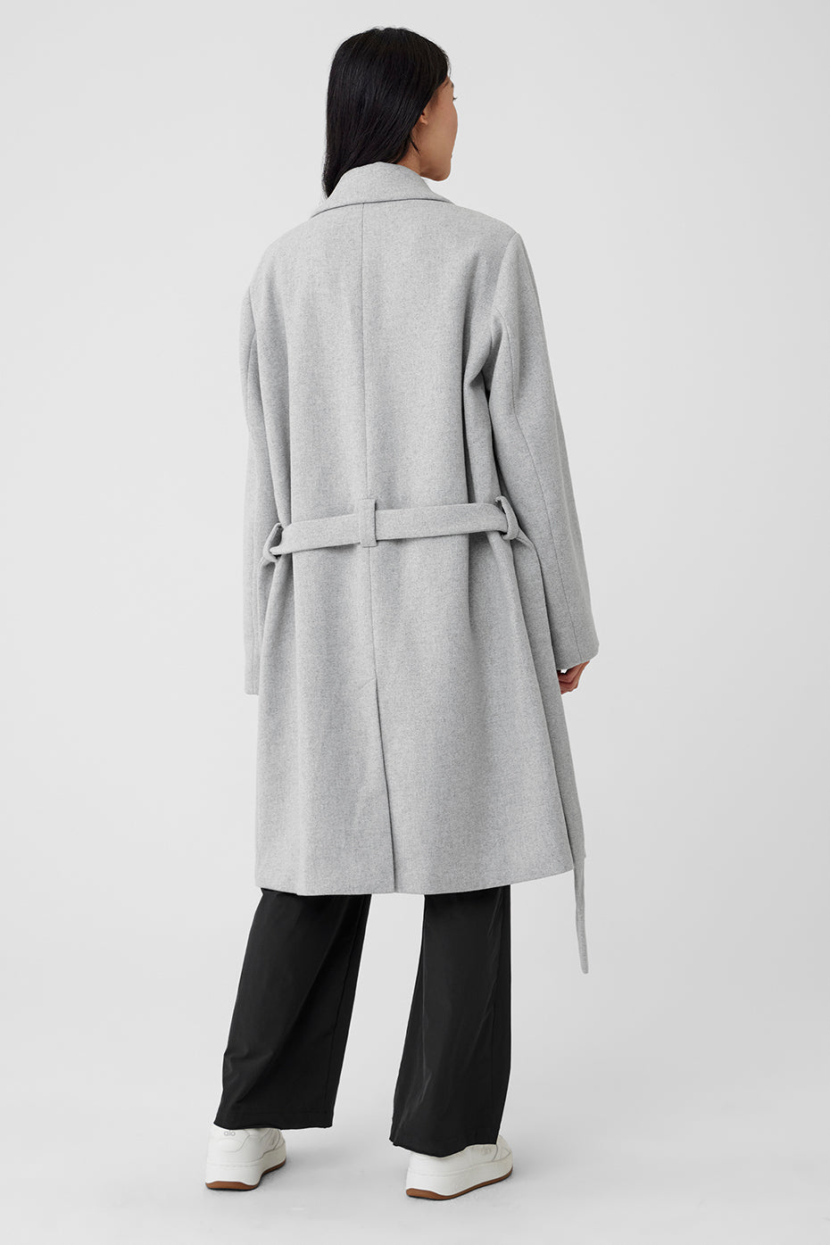 Side view of the athletic heather grey wool coat, highlighting the waist belt.