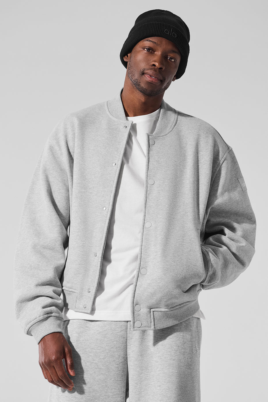 Front view of the varsity jacket showing the button closure and drop shoulders
