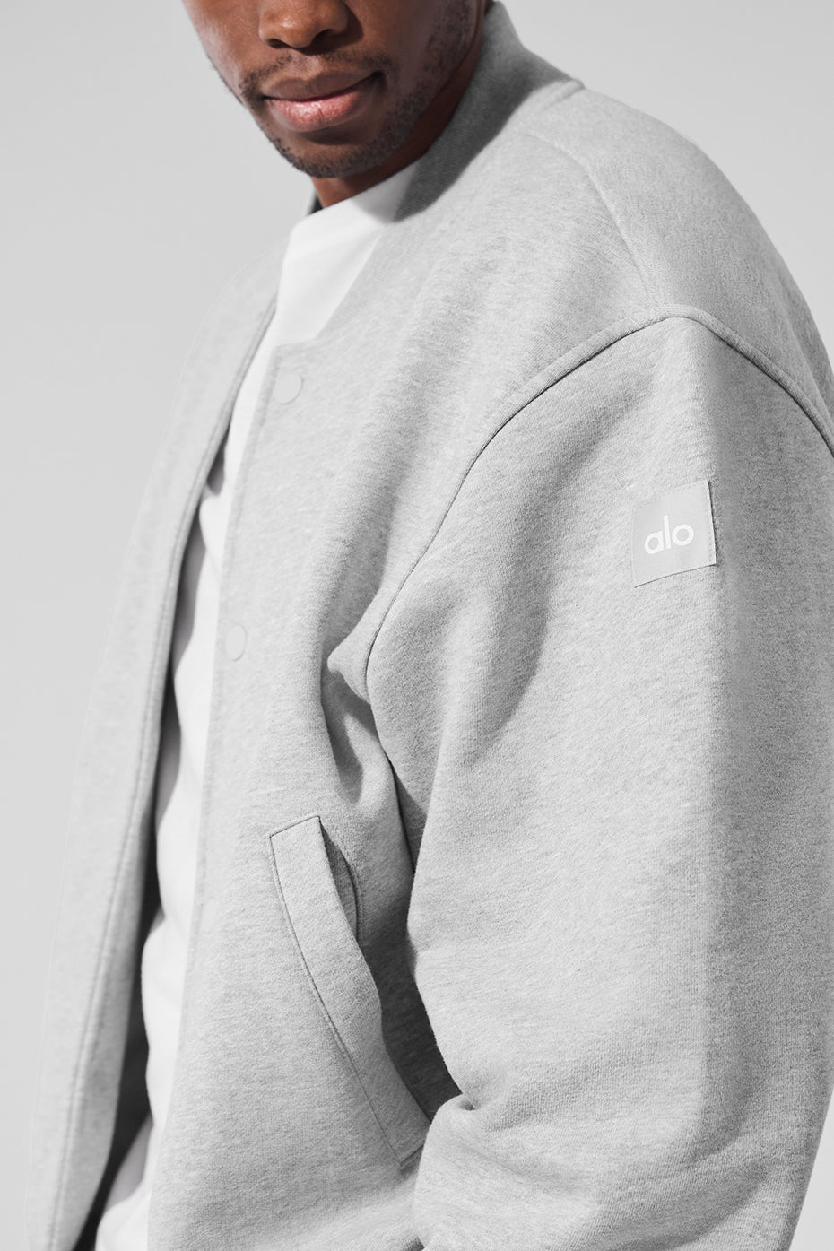 Close-up of the front slip pockets on the custom varsity jacket