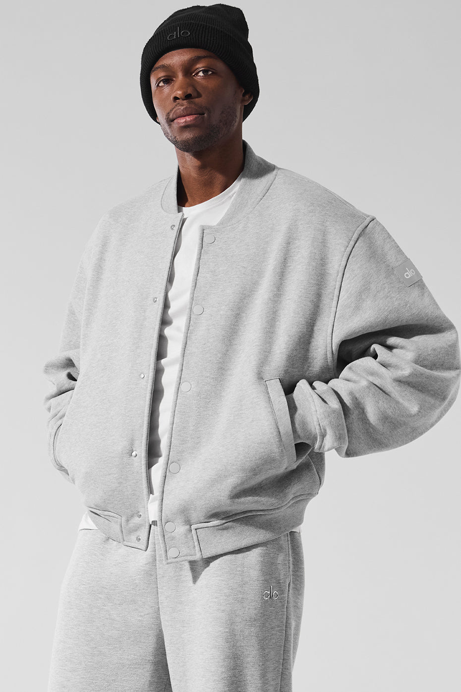 Front view of the varsity jacket showing the button closure and drop shoulders